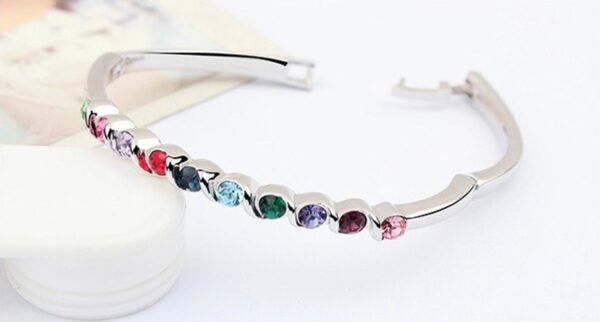 Sterling Silver Coated Bracelet boasting 10 Round Stones