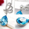 925 Sterling Silver Coated Teardrop Pendant Necklace with Sparkling Crystal and Butterfly Design - Aquamarine Sea Blue