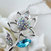 925 Sterling Silver Coated Rose Flower Pendant Necklace with Stone Embellishments and Sparkling Crystal - Turquoise Blue